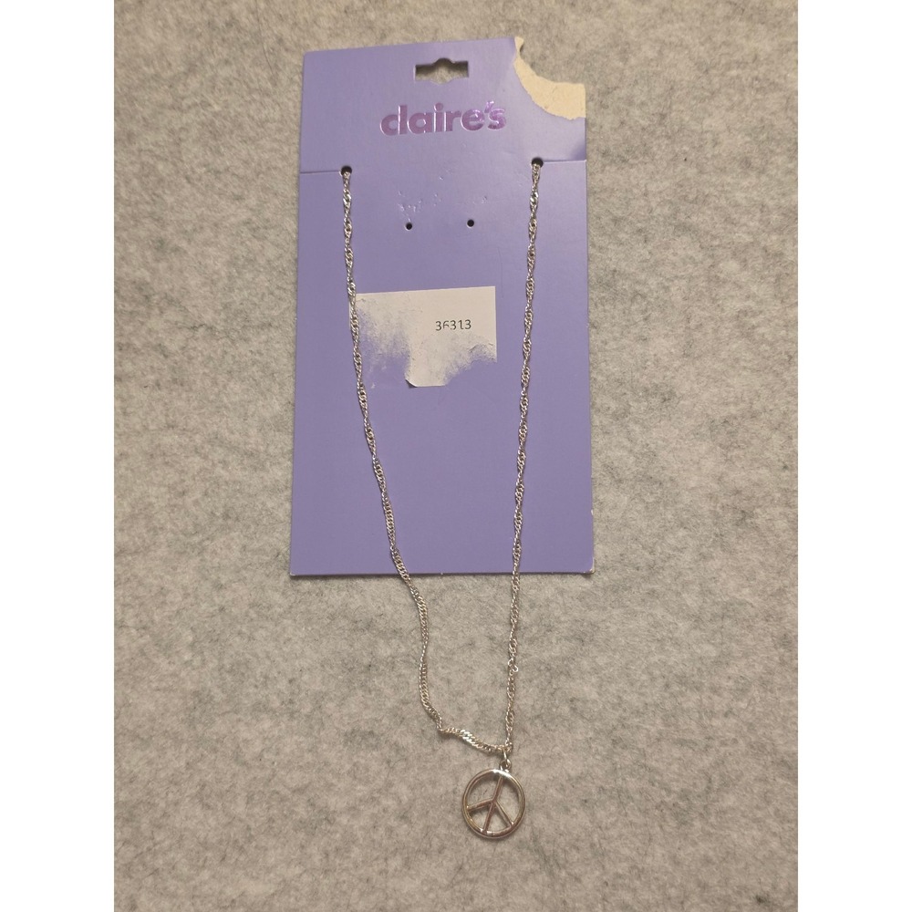 Claire's peace sign necklace